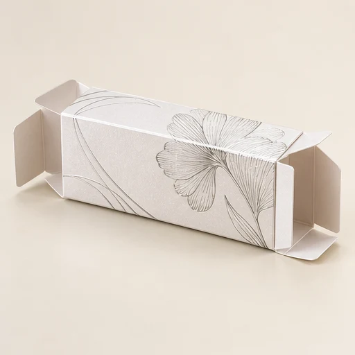 Straight tuck end (STE): Top and bottom tuck flaps hinge from the same panel. Both ends open from the same side of the carton.