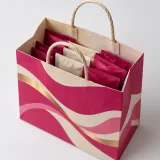 Tea sachets — Twisted-paper handle bag