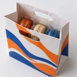 Sealed macarons — Die-cut handle paper bag