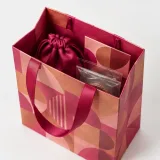 Jewelry pouch — Ribbon-handle paper bag