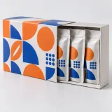 Coffee pouches — Paperboard sleeve and tray