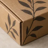 Custom kraft product mailer with thank-you card packaging — Roll-end mailer — Material & finish