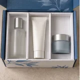 Custom three-compartment skincare mailer packaging — Divided roll-end mailer — Product & insert