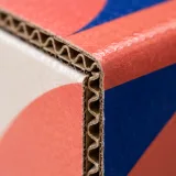 Custom jewelry pouch packaging — Corrugated sleeve and tray — Material & finish