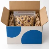 Sealed granola pouch — Four-flap shipping carton