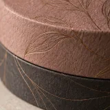 Custom solid perfume packaging — Round lift-off box — Material & finish