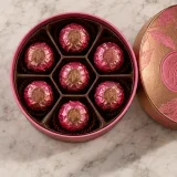 Custom chocolate truffle packaging — Round lift-off box — Product & insert